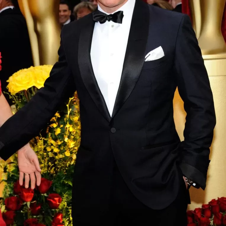 Rami Malek wearing black tie