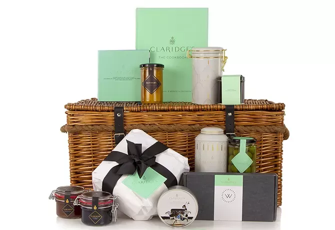 Gifts laid out around Claridges Bond Hamper
