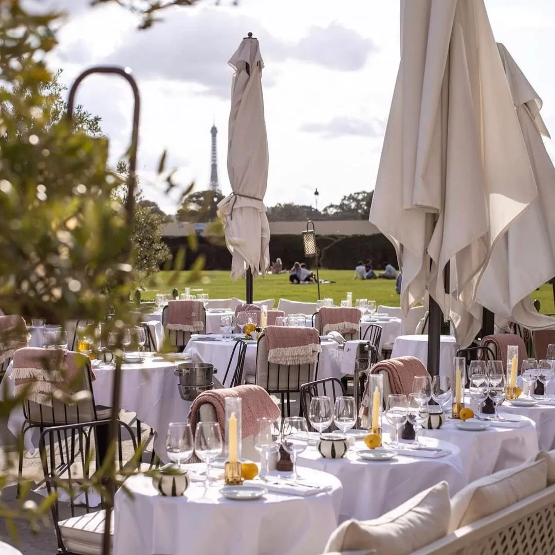 Outside dining area facing park in LouLou, Paris
