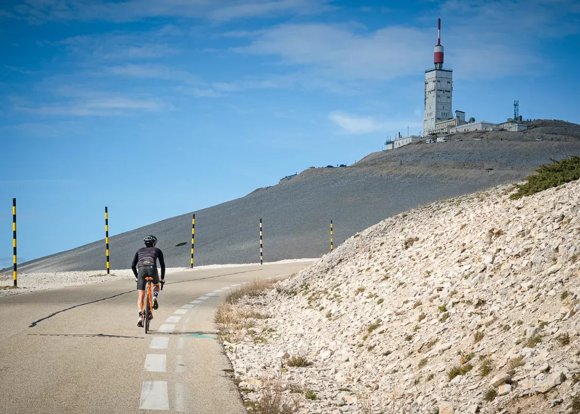 Cyclist cycling through the climbs and the vines of The Ventoux, Provence, France