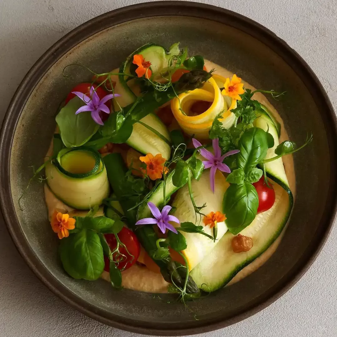 Beautifully displayed garnished bowl of vegetables served at HIDE, London
