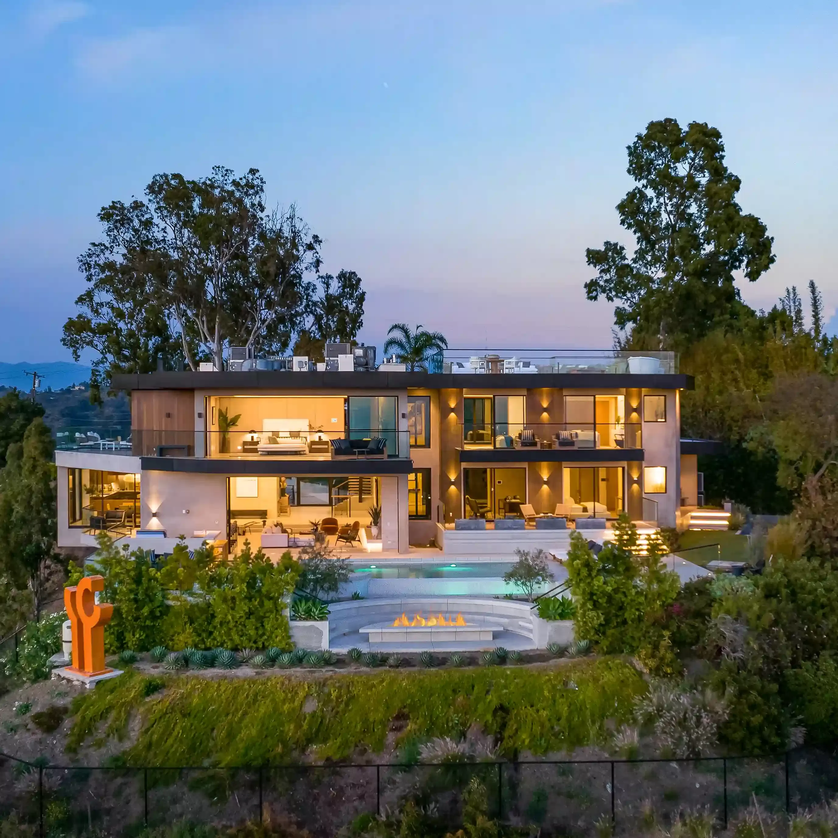 Outside view of luxury estate home with pool in LA