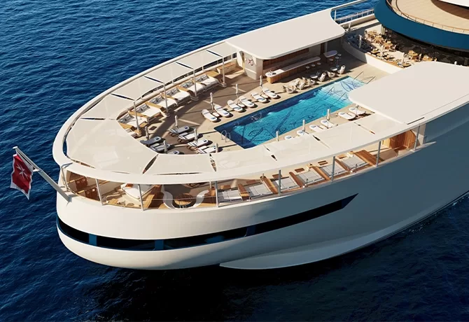 A luxurious yacht with a spacious deck featuring a pool, lounge chairs, and a shaded seating area. The yacht is cruising in calm blue waters, with a flag at the rear.