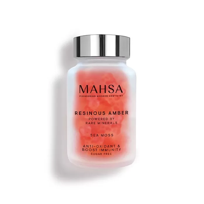 A frosted glass bottle with a silver cap containing Resinous Amber Sea Moss by Mahsa. The label highlights its properties: powered by rare minerals, anti-oxidant, boost immunity, and sugar-free.