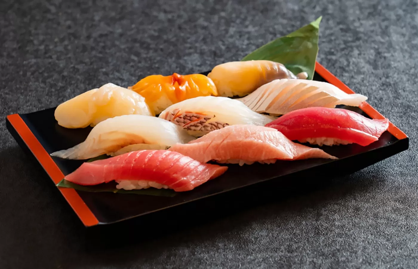 Colourful sushi on a sushi tray