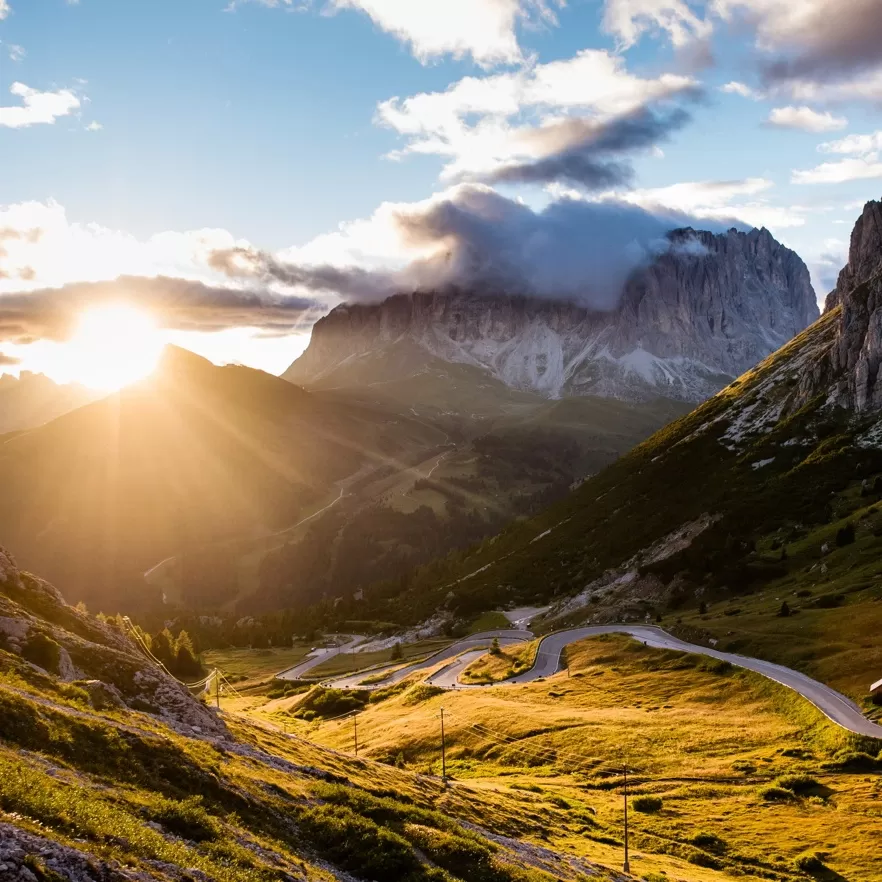 View of the sunset over the mountains and hills of the Dolomites, Italy